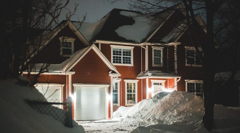 image of a house covered in snow